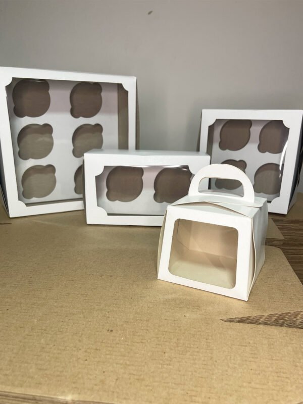 Cajas cupcake blancas con nidos movibles